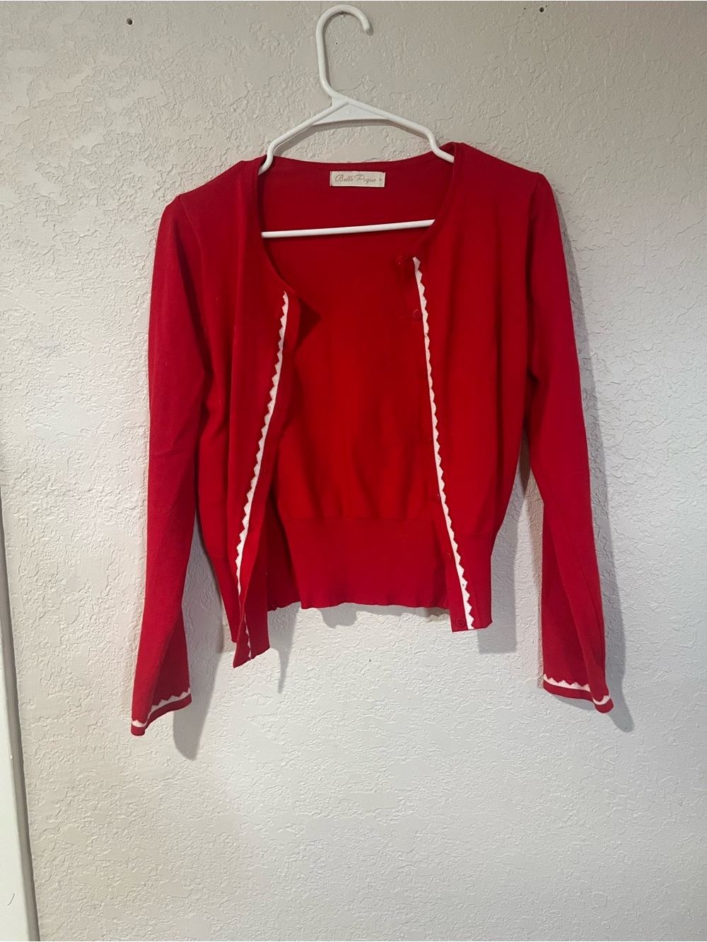 Red Cardigan with white detail by Belle Poque size medium